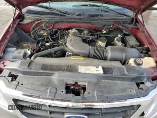 1999 Ford F-150 XL with VIN 1FTRX17LXXNA05552, listed as a Copart auction lot 60047025 with 193,122 mi miles and Salvage title. Bid and sale history available at DreamBid. Image 11.