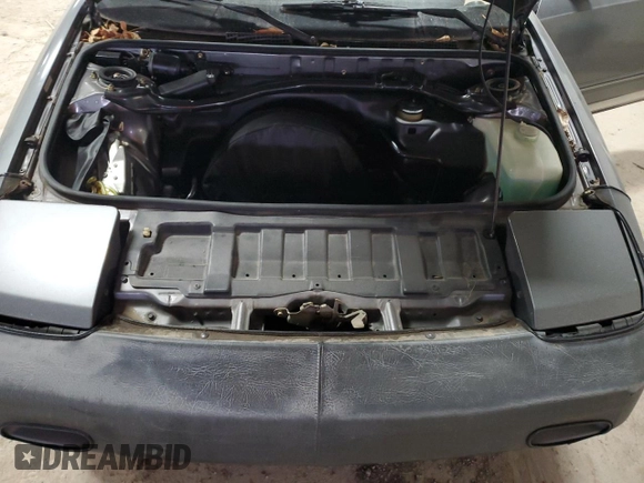 1989 Toyota MR2 z VIN JT2AW15C1K0150268, wystawiony jako Copart lot #86257134 z przebiegiem 93 969 mil mil oraz Tytuł czysty. Historia ofert i sprzedaży dostępna na DreamBid. Obrazek 11.