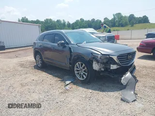 2018 Mazda CX-9 Grand Touring with VIN JM3TCADY7J0217595, listed as a IAAI auction lot 42381331 with 130,604 mi miles and . Bid and sale history available at DreamBid. Image 1.