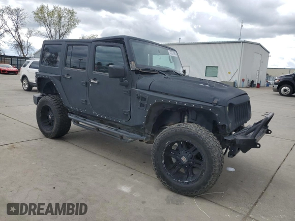 2015 Jeep Wrangler Unlimited Wrangler X with VIN 1C4HJWEG7FL649231, listed as a Copart auction lot 47972905 with 133,895 mi miles and Salvage title. Bid and sale history available at DreamBid. Image 4.