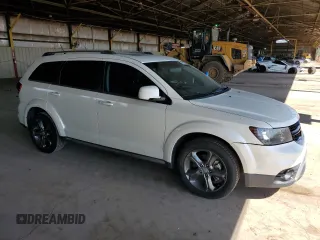 2015 Dodge Journey Crossroad with VIN 3C4PDCGG9FT631347, listed as a Copart auction lot 53991675 with 77,084 mi miles and Salvage Title. Bid and sale history available at DreamBid. Image 4.