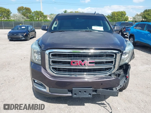 2016 GMC Yukon SLT with VIN 1GKS2BKC2GR277460, listed as a IAAI auction lot 42027026 with 111,191 mi miles. Bid and sale history available at carsss.com. Image 13.