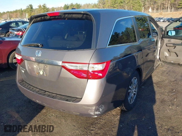 2013 Honda Odyssey EX-L with VIN 5FNRL5H64DB034860, listed as a IAAI auction lot 42013204 with 104,314 mi miles and . Bid and sale history available at carsss.com. Image 4.