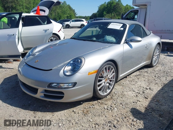 2006 Porsche 911 Carrera S z VIN WP0CB29976S766616, wystawiony jako IAAI lot #42119525 z przebiegiem 57 164 mil mil oraz . Historia ofert i sprzedaży dostępna na DreamBid. Obrazek 17.