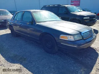 1998 Ford Crown Victoria Police Pkg with VIN 2FAFP71WXWX184526, listed as a IAAI auction lot 41563307 with 309,303 mi miles. Bid and sale history available at carsss.com. Image 1.