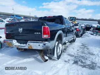 2015 Ram 2500 Laramie with VIN 3C6UR5FLXFG584408, listed as a IAAI auction lot 41588107 with 177,520 mi miles. Bid and sale history available at carsss.com. Image 4.