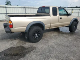 2002 Toyota Tacoma with VIN 5TEWM72N12Z093226, listed as a Copart auction lot 61019955 with 103,657 mi miles and Clean title. Bid and sale history available at DreamBid. Image 3.