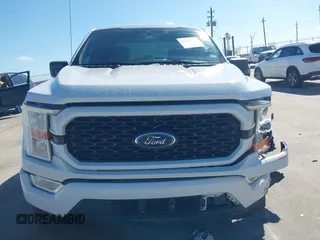 2021 Ford F-150 XL with VIN 1FTEW1CP2MFA09742, listed as a IAAI auction lot 41675603 with 94,983 mi miles. Bid and sale history available at carsss.com. Image 13.