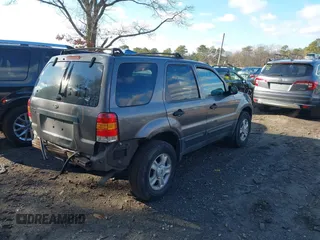 2003 Ford Escape XLT Popular 2 with VIN 1FMYU931X3KC87514, listed as a IAAI auction lot 41222513 with 267,880 mi miles. Bid and sale history available at carsss.com. Image 4.