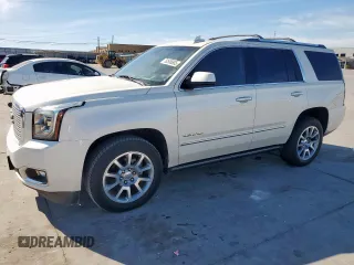2015 GMC Yukon Denali z VIN 1GKS2CKJ6FR706151, wystawiony jako Copart lot #50556805 z przebiegiem 174 259 mil mil oraz Czysty tytuł • Clean title. Historia ofert i sprzedaży dostępna na DreamBid. Obrazek 1.
