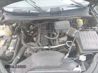 2002 Jeep Grand Cherokee Laredo with VIN 1J4GW48S92C294116, listed as a IAAI auction lot 42080375 with 154,108 mi miles and . Bid and sale history available at DreamBid. Image 10.