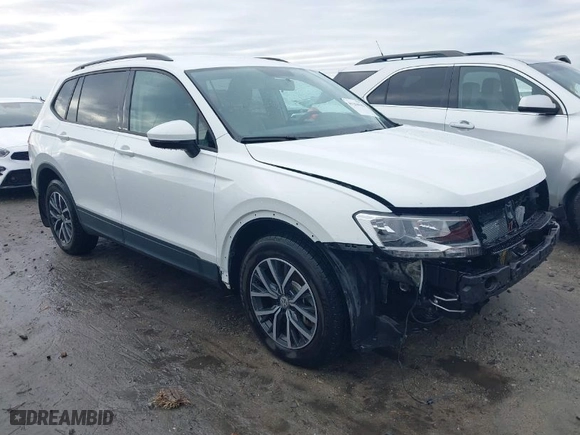 2021 Volkswagen Tiguan S with VIN 3VV1B7AX5MM045667, listed as a IAAI auction lot 41256945 with 90,523 mi miles. Bid and sale history available at carsss.com. Image 1.