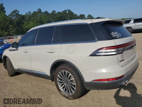 2021 Lincoln Aviator Reserve with VIN 5LM5J7WCXMGL13284, listed as a Copart auction lot 63084695 with 91,002 mi miles and Salvage title. Bid and sale history available at DreamBid. Image 2.