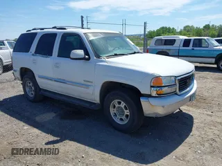 2001 GMC Yukon SLT z VIN 1GKEK13TX1R218315, wystawiony jako IAAI lot #42448454 z przebiegiem 290 859 mil mil oraz . Historia ofert i sprzedaży dostępna na DreamBid. Obrazek 1.