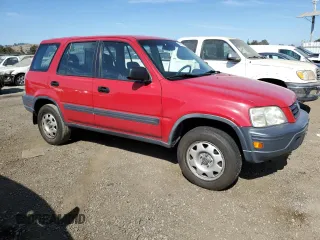 2000 Honda CR-V LX with VIN JHLRD2842YC011450, listed as a Copart auction lot 72453704 with 127,024 mi miles and Salvage Title. Bid and sale history available at carsss.com. Image 4.
