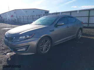 2013 Kia Optima SX w/Limited Pkg with VIN 5XXGR4A67DG191290, listed as a IAAI auction lot 41864684 with 136,525 mi miles. Bid and sale history available at carsss.com. Image 18.