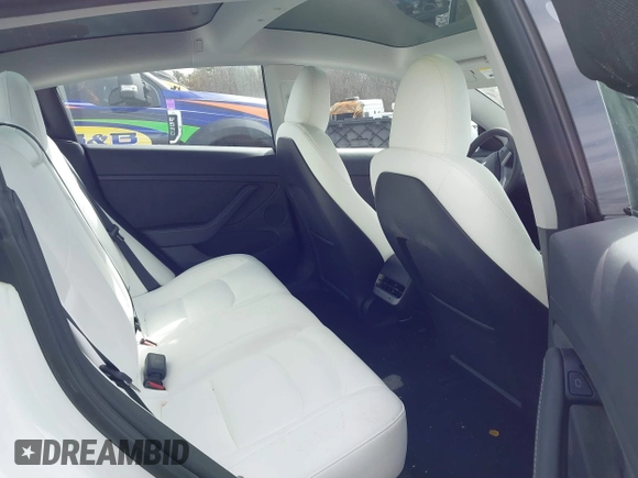2023 Tesla Model 3 z VIN 5YJ3E1EA8PF671613, wystawiony jako IAAI lot #41737438 z przebiegiem 21 405 mil mil oraz . Historia ofert i sprzedaży dostępna na DreamBid. Obrazek 8.