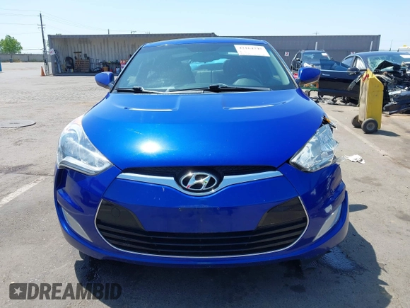 2013 Hyundai Veloster w/Black Int with VIN KMHTC6AD6DU143974, listed as a IAAI auction lot 42164745 with 136,195 mi miles and . Bid and sale history available at DreamBid. Image 12.