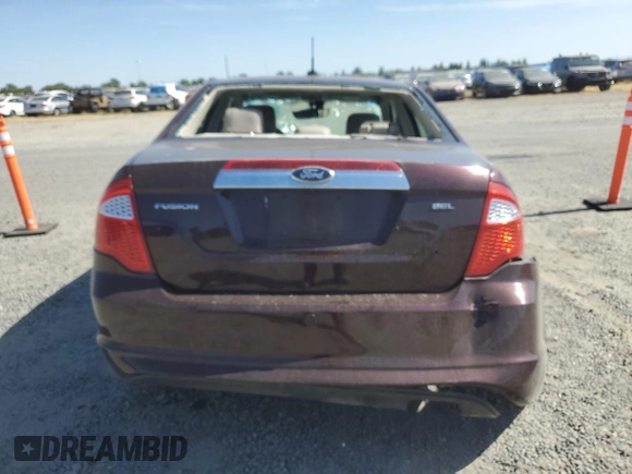 2012 Ford Fusion SEL z VIN 3FAHP0JA5CR365855, wystawiony jako Copart lot #58206175 z przebiegiem 72 223 mil mil oraz Szkoda całkowita • Salvage title. Historia ofert i sprzedaży dostępna na DreamBid. Obrazek 6.