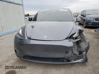 2022 Tesla Model Y Performance with VIN 7SAYGDEF1NF491967, listed as a Copart auction lot 51119515 with 50,520 mi miles and Salvage title. Bid and sale history available at DreamBid. Image 5.