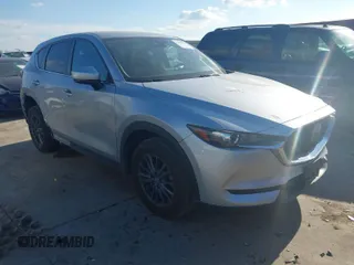 2020 Mazda CX-5 Touring with VIN JM3KFACMXL1786200, listed as a IAAI auction lot 41506139 with 121,944 mi miles. Bid and sale history available at carsss.com. Image 1.