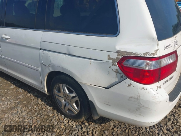 2007 Honda Odyssey EX-L z VIN 5FNRL38617B415770, wystawiony jako IAAI lot #42208632 z przebiegiem 269 375 mil mil oraz . Historia ofert i sprzedaży dostępna na DreamBid. Obrazek 6.
