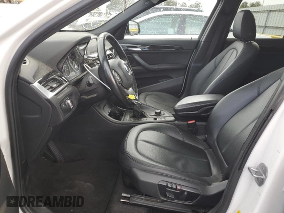 2017 BMW X1 sDrive28i with VIN WBXHU7C39H5H37756, listed as a Copart auction lot 50769975 with 82,479 mi miles and Salvage Title. Bid and sale history available at carsss.com. Image 7.