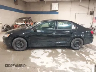 2014 Volkswagen Jetta Sedan S with VIN 3VW1K7AJ7EM445531, listed as a IAAI auction lot 41570775 with 101,522 mi miles. Bid and sale history available at carsss.com. Image 12.