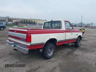 1989 Ford F-150 with VIN 1FTEF14NXKKA50427, listed as a IAAI auction lot 42449724 with 98,001 mi miles and . Bid and sale history available at DreamBid. Image 4.