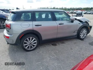 2023 MINI Clubman Cooper S with VIN WMWXJ1C03P2U08484, listed as a IAAI auction lot 41056651 with 12,948 mi miles. Bid and sale history available at carsss.com. Image 4.
