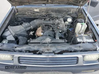 1994 Mitsubishi Mighty Max z VIN JA7LS21G6RP012556, wystawiony jako Copart lot #44242825 z przebiegiem 213 338 mil mil oraz Szkody całkowita. Historia ofert i sprzedaży dostępna na DreamBid. Obrazek 11.