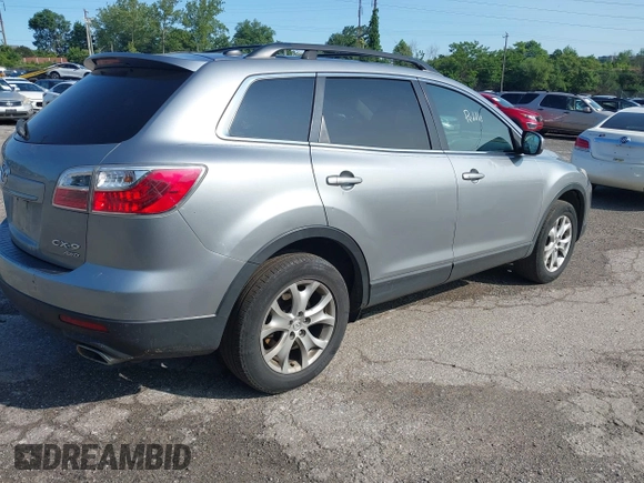 2012 Mazda CX-9 Touring with VIN JM3TB3CV7C0365934, listed as a IAAI auction lot 42381671 with 237,298 mi miles and . Bid and sale history available at DreamBid. Image 4.