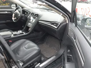 2017 Ford Fusion Titanium z VIN 3FA6P0K98HR200272, wystawiony jako IAAI lot #41905017 z przebiegiem 104 132 mil mil oraz . Historia ofert i sprzedaży dostępna na DreamBid. Obrazek 5.