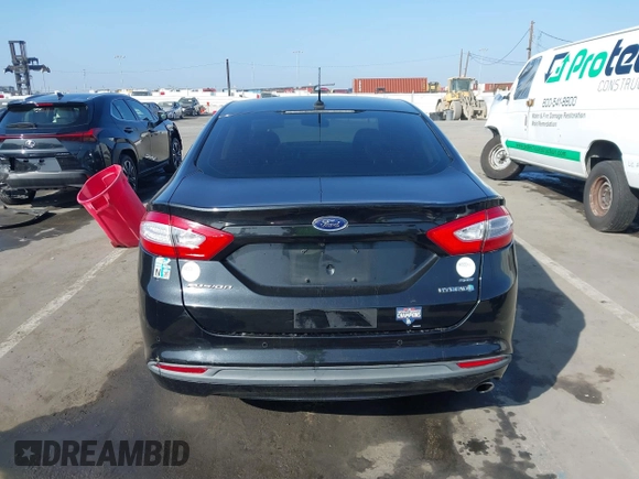 2013 Ford Fusion SE Hybrid with VIN 3FA6P0LU4DR325699, listed as a IAAI auction lot 41677237 with 129,004 mi miles. Bid and sale history available at carsss.com. Image 16.