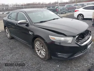 2014 Ford Taurus Limited with VIN 1FAHP2F81EG113984, listed as a IAAI auction lot 41542792 with 213,206 mi miles. Bid and sale history available at carsss.com. Image 1.