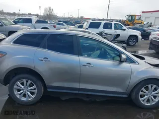 2010 Mazda CX-7 Touring with VIN JM3ER4WL1A0306704, listed as a IAAI auction lot 41805691 with 171,616 mi miles. Bid and sale history available at carsss.com. Image 14.