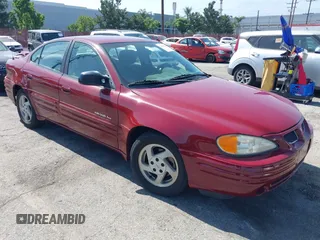 1999 Pontiac Grand Am SE2 with VIN 1G2NE52T0XM702788, listed as a IAAI auction lot 42564414 with 195,067 mi miles and . Bid and sale history available at DreamBid. Image 1.
