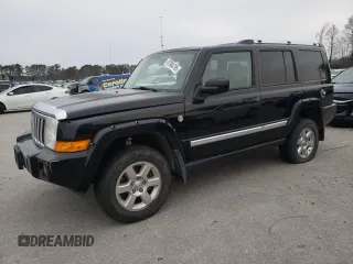 2007 Jeep Commander Overland with VIN 1J8HG68247C557731, listed as a Copart auction lot 87964795 with 174,195 mi miles and Salvage title. Bid and sale history available at DreamBid. Image 1.
