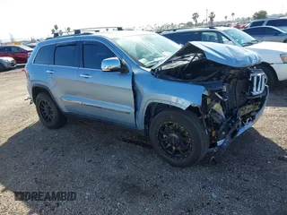 2012 Jeep Grand Cherokee Limited z VIN 1C4RJFBTXCC341813, wystawiony jako IAAI lot #41791662 z przebiegiem 120 811 mil mil oraz . Historia ofert i sprzedaży dostępna na DreamBid. Obrazek 1.