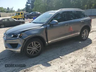 2016 Volkswagen Touareg Sport с VIN WVGEF9BP1GD012594, выставлен на аукционе Copart как лот 52438305 с пробегом 125 204 миль миль и Списание • Salvage title. История ставок и продаж доступна на DreamBid. Изображение 1.