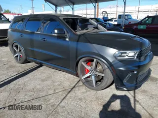 2021 Dodge Durango SRT Hellcat z VIN 1C4SDJH99MC818692, wystawiony jako IAAI lot #41070204 z przebiegiem 12 105 mil mil oraz . Historia ofert i sprzedaży dostępna na DreamBid. Obrazek 1.