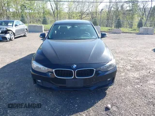 2015 BMW 3 Series 320i with VIN WBA3B1G55FNT04870, listed as a IAAI auction lot 42141211 with 249,720 mi miles. Bid and sale history available at carsss.com. Image 12.