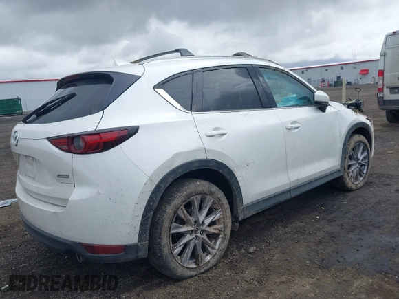 2019 Mazda CX-5 Grand Touring with VIN JM3KFBDM9K0697467, listed as a IAAI auction lot 41940364 with 62,015 mi miles. Bid and sale history available at carsss.com. Image 4.