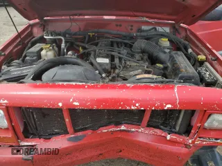 1999 Jeep Cherokee Sport with VIN 1J4FF68S4XL580048, listed as a Copart auction lot 62546365 with 154,059 mi miles and Clean title. Bid and sale history available at DreamBid. Image 12.