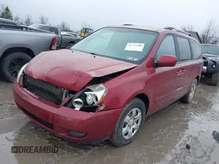 2009 Kia Sedona LX with VIN KNDMB233196282656, listed as a IAAI auction lot 41737300 with 95,971 mi miles. Bid and sale history available at carsss.com. Image 2.