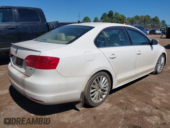 2013 Volkswagen Jetta TDI w/Premium with VIN 3VW3L7AJ4DM361445, listed as a IAAI auction lot 41735571 with 133,894 mi miles and . Bid and sale history available at DreamBid. Image 4.