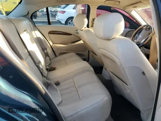 2003 Jaguar S-Type z VIN SAJEA01U73HM48330, wystawiony jako Copart lot #80128574 z przebiegiem Nie podano mil oraz Szkody całkowita. Historia ofert i sprzedaży dostępna na DreamBid. Obrazek 10.