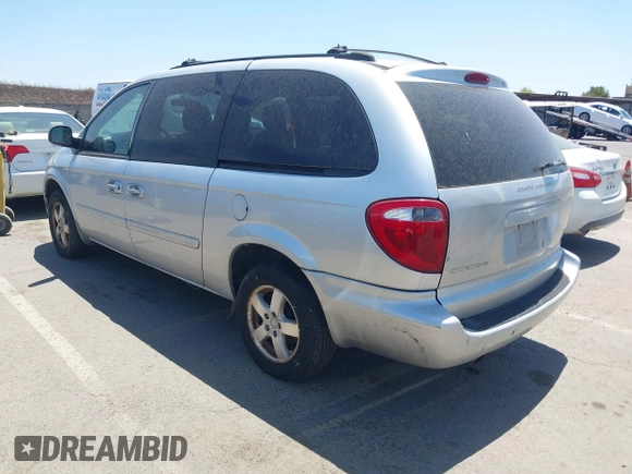 2005 Dodge Caravan SXT with VIN 2D4GP44L55R374299, listed as a IAAI auction lot 42560914 with 237,568 mi miles and . Bid and sale history available at DreamBid. Image 3.