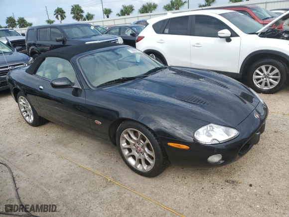 2001 Jaguar XK8 with VIN SAJDA42B91PA12780, listed as a Copart auction lot 73999194 with 0 mi miles and Non Repairable. Bid and sale history available at carsss.com. Image 4.
