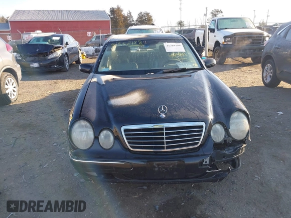 2002 Mercedes-Benz E-Class with VIN WDBJF65J32B485019, listed as a IAAI auction lot 41388188 with 119,417 mi miles. Bid and sale history available at carsss.com. Image 12.